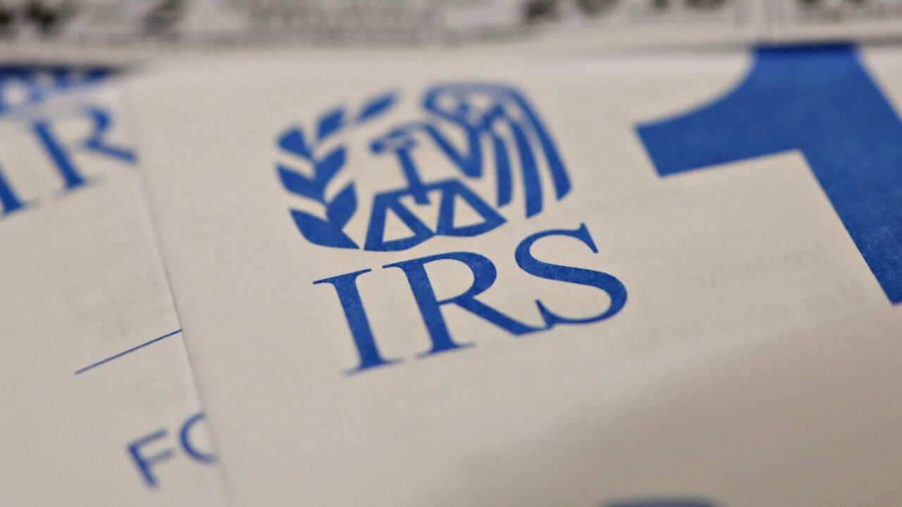 U.S. Department of the Treasury Internal Revenue Service (IRS) 1040 Individual Income Tax form packets for the 2018 tax year are arranged for a photograph in Tiskilwa, Illinois, U.S., on Monday, March 11, 2019. Fewer people are getting refunds this year and that's causing angst for Republicans who want to convince voters that the 2017 tax overhaul really did give them a tax cut. Photographer: Daniel Acker/Bloomberg