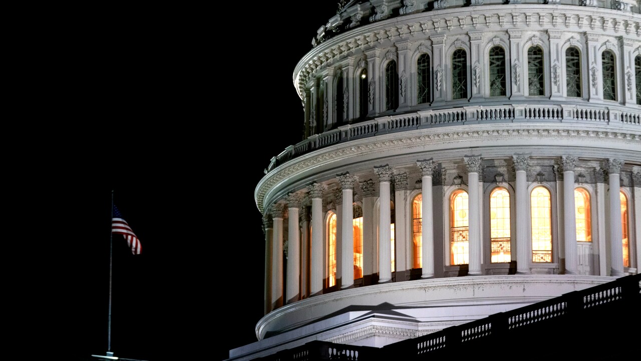 The U.S. Capitol dome is lit up at night in Washington, D.C.