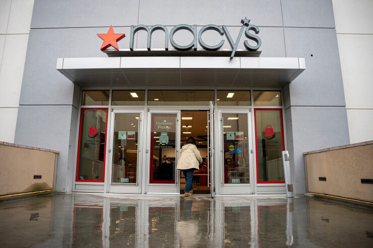 A shopper enters a Macy's store in Walnut Creek, California.