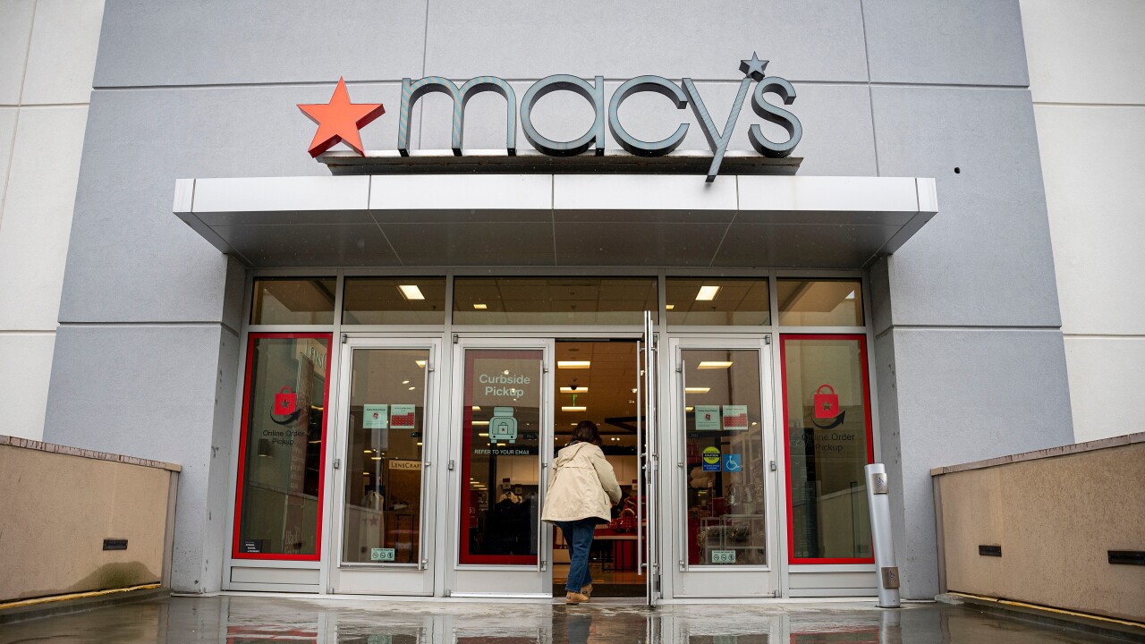 A shopper enters a Macy's store in Walnut Creek, California.